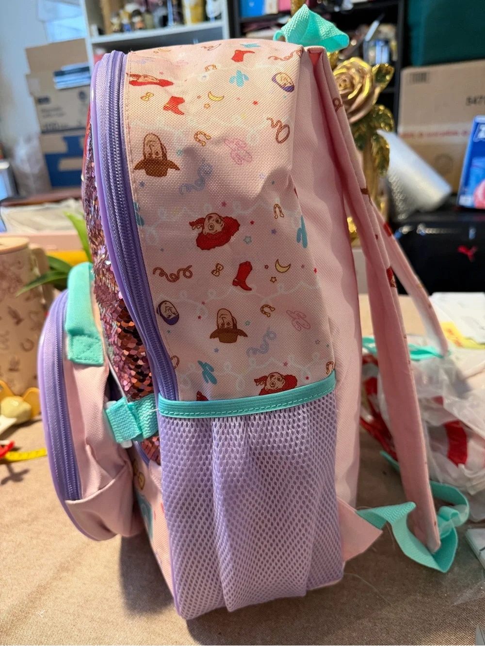 Disney Jessie Sequin Kids Backpack in Pink, Purple & Red